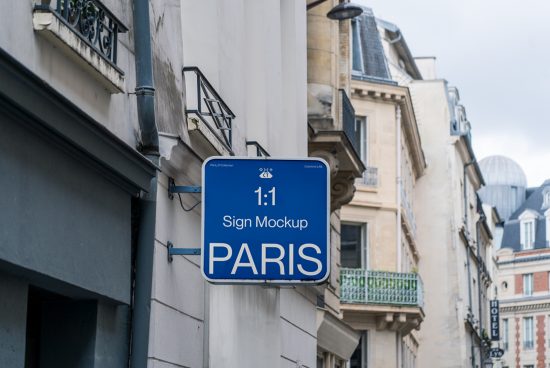 Urban outdoor sign mockup on Parisian building, realistic street signage, designer template for presentation, blue sign with editable text.